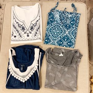 Bundle of 4 women’s tank tops.